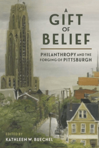 Cover of "Gift of Belief" book. It is a painting of the tall University of Pittsburgh Cathedral of Learning building behind a row of two-story houses and trees.